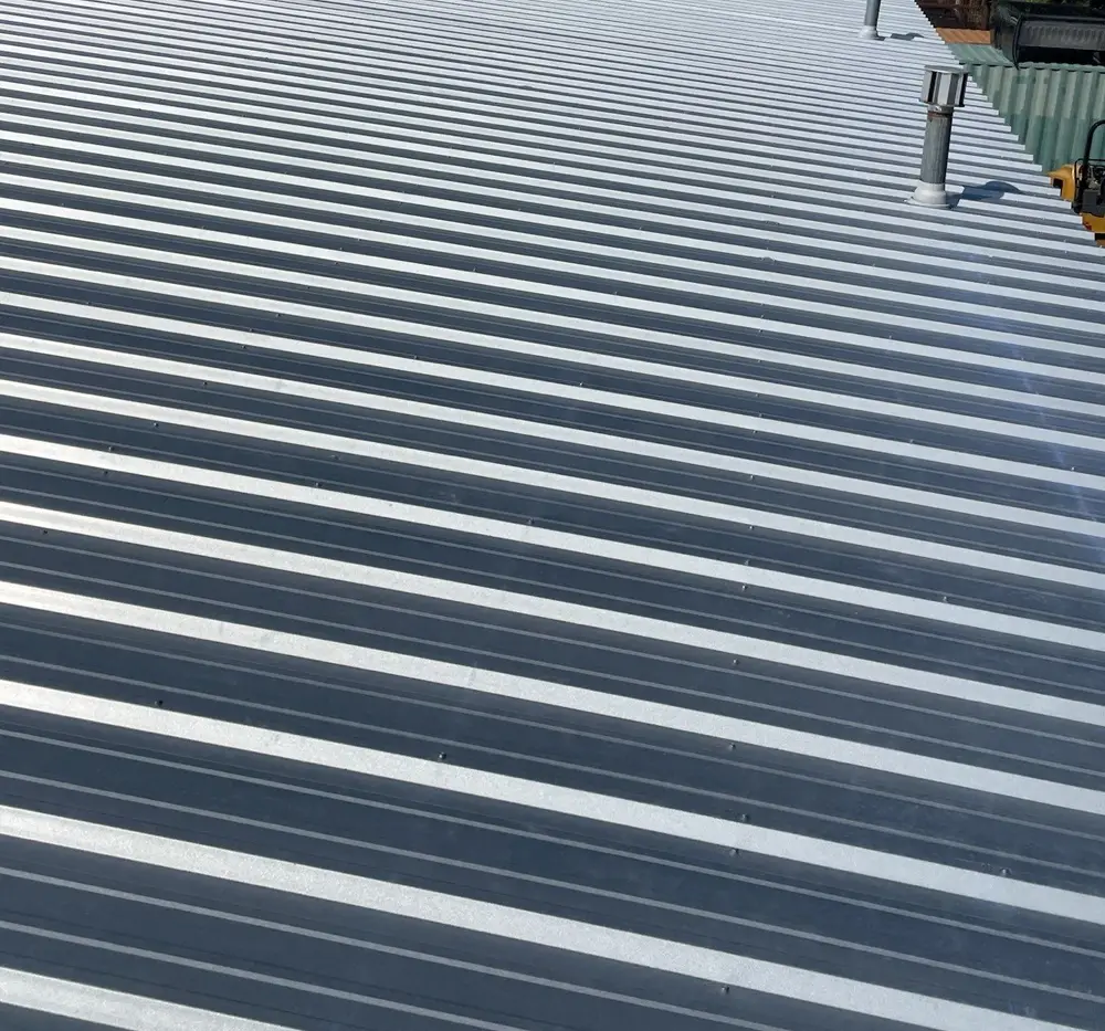 Metal shop roof installed by Homer Roofing in North Logan, Utah