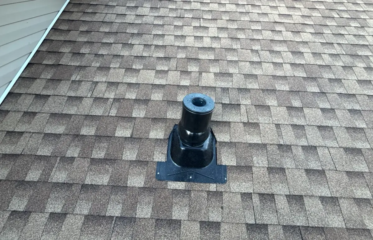 New pipe boot flashing set into a freshly shingled roof on a Roy, Utah home by Homer Roofing