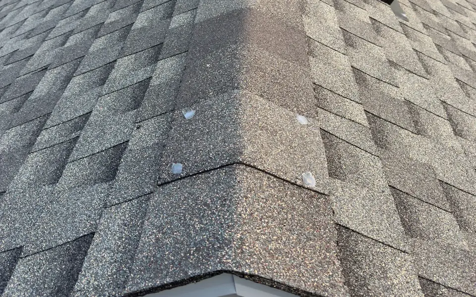 Hip cap shingles on a new asphalt shingle roof
